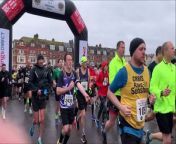 Footage shows the start of the half marathon.